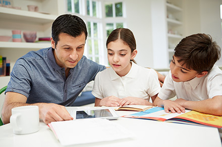 Adult ELL parent studying with kids web