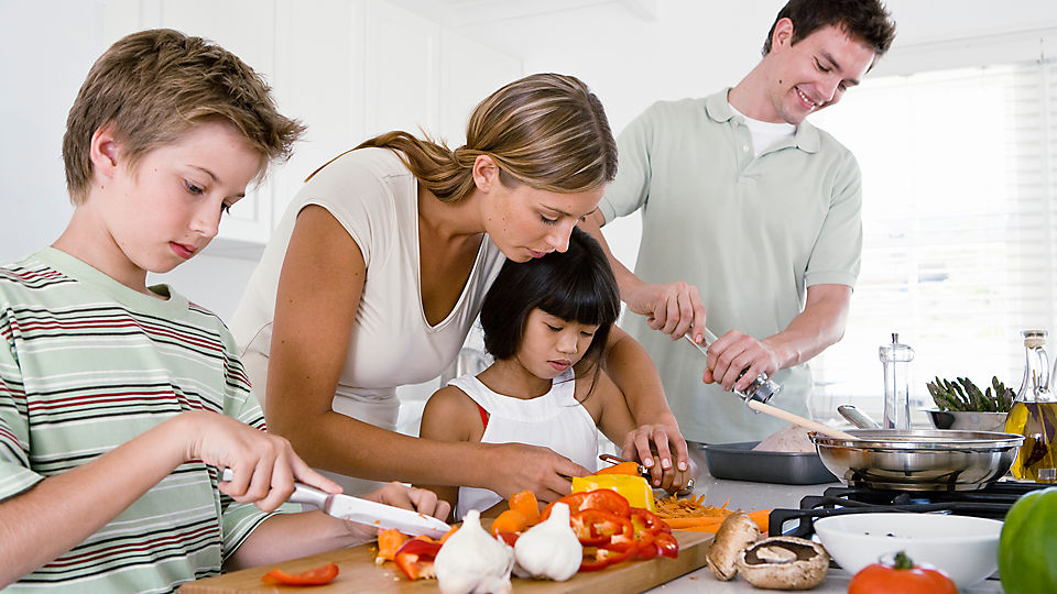 kindergartener cooking with parent 02