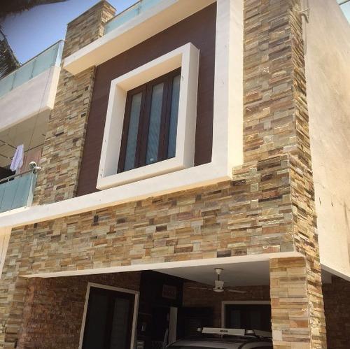 rumah dengan wall cladding